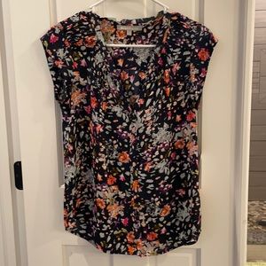 Cap Sleeve V neck blouse.